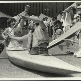 Nicole O'Toole (Pharmacy) and Michael Crawford (Economics) in Canoe on Front Lawn at Orientation Week