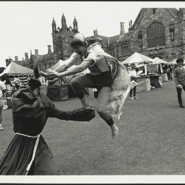 Students in Medieval Dress Acting Out on the Front Lawn During Orientation Week