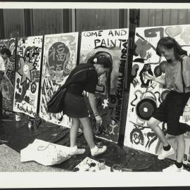 Students Painting on Panels Outside Fisher Library During Enrolment 1989