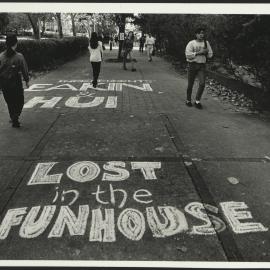 Chalk Advertising on Pavement for 'Independents Eakin and Hui' as well as for 'Lost in the Funhouse'