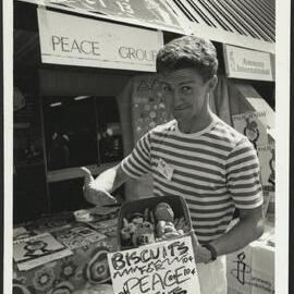 A Peace Group Student Selling "Biscuits for Peace" at Orientation Week
