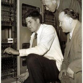 Visitors Watching the Installation and Testing of the Machine