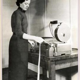 Program Librarian Judith Ogilvie with Preparing Tape for SILLIAC