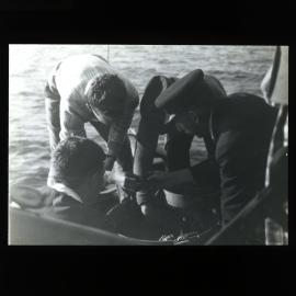Men Working on Station Yacht Thistle