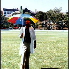 Roger Carolin Umpiring a Botany Versus Zoology Cricket Match