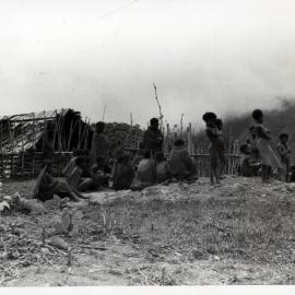 Group Gathered in Front of Buildings