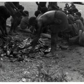 Men Preparing a Fire