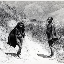 Woman and Man Standing on Path