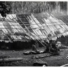 Group Sitting in Front of Building