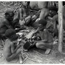 Children Playing with Briefcase