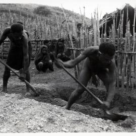 Men Digging Grave