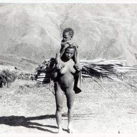Women with a Child on her Shoulders