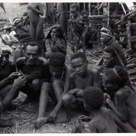 Group Gathered in Front of Buildings