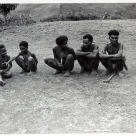 Men and Children Sitting