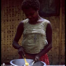 Woman Cleaning Dishes