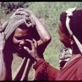 Two Women with Net Bags