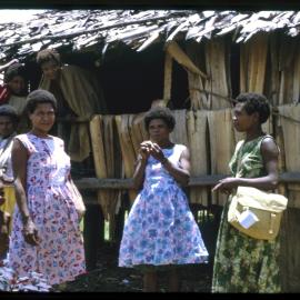 Women Standing in Front of a Building