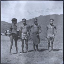 Four Men Standing Near Hamlet