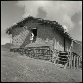 Building With Woven Walls and Raised Porch