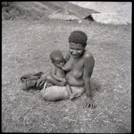 Woman Breastfeeding Child