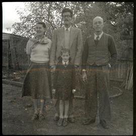 Woman, Two Men and Child