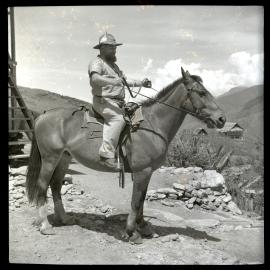 Man Mounted on Horse