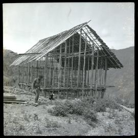 Man Standing in Front of Partially-Constructed Building