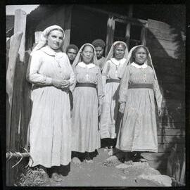 Group Standing at Building Entrance