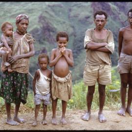 Men, Woman and Three Children Standing on Mountainside