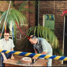Cutting the Cake at Henry Dos Reis' 50th Birthday Celebrations