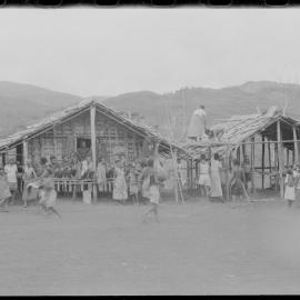 People Gathered Around a Building