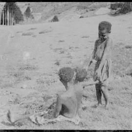 Woman with Baby and Child