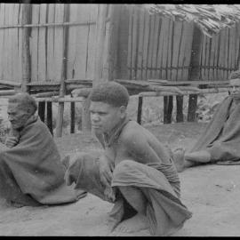 People Sitting Outside a Building