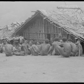 Group Gathered Outside Buildings