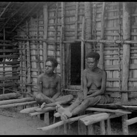 Man and Woman Outside a Building