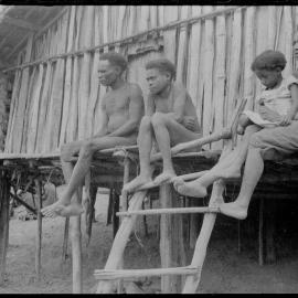 Group Sitting Outside a Building