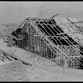 Man Constructing Building