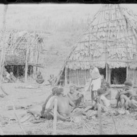 Group Gathered Outside Buildings