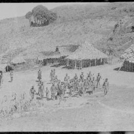 Group Gathered Outside Buildings