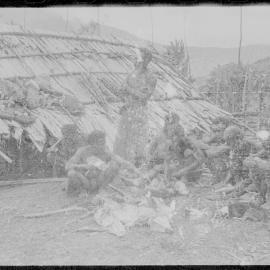 Group Sitting Outside a Building