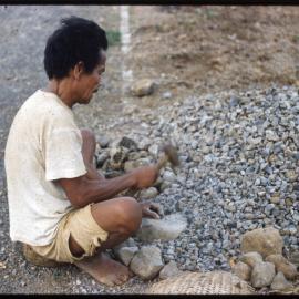 Man Breaking Rocks
