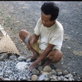 Man Breaking Rocks