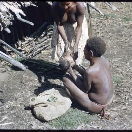 Women Sitting with Baby