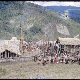 Crowd Preparing for a Ceremony