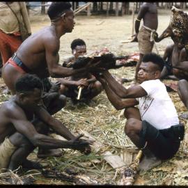 Men Distributing Food
