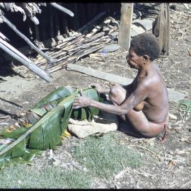 Woman Sitting Outside a Building