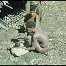 Women Sitting with Baby