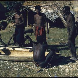 Group Possibly Constructing a Log Coffin