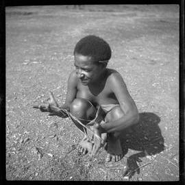 Girl Playing with String