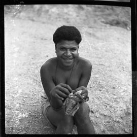 Girl Holding Piece of Cloth
